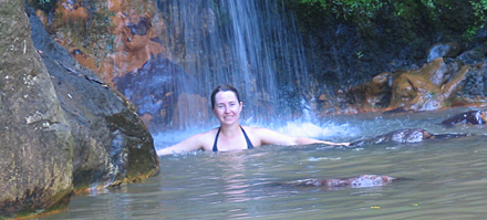 Me, bathing in the waterfall at Caldeira Velha