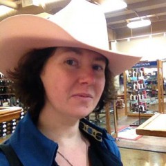 At a western store falling slightly in love with a pink cowboy hat.